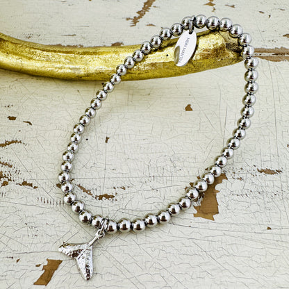 Kugelarmband mit Walflosse