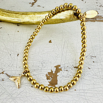 Kugelarmband mit Walflosse
